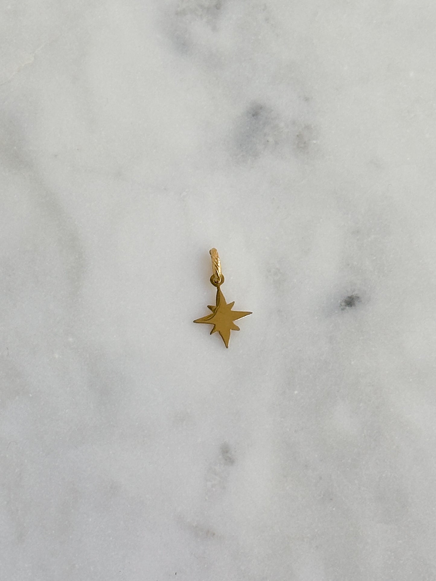 Eight Point Star Burst Charm
